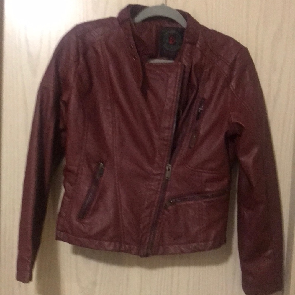 Dollhouse faux leather jacket size large. New without tag.